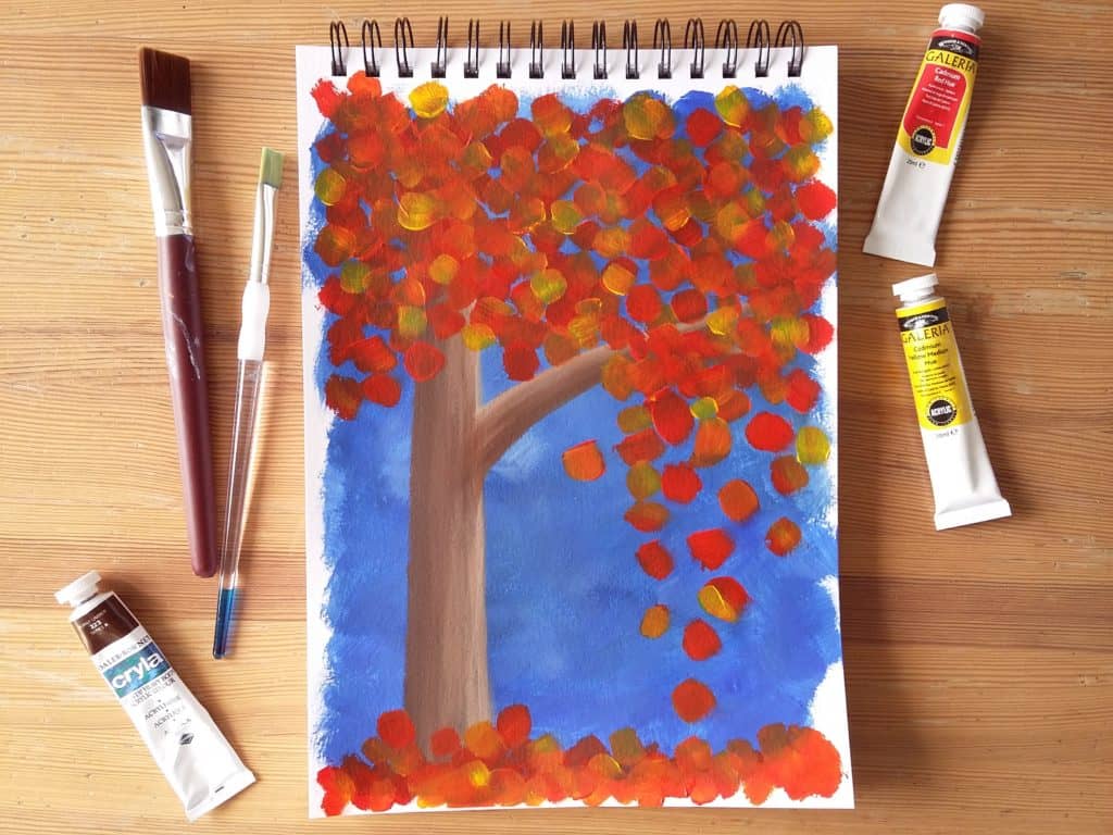 Learn how to paint this abstract autumn tree with acrylic paint. It’s both simple and quick to do, with only three steps to follow! Click through to follow the tutorial. 