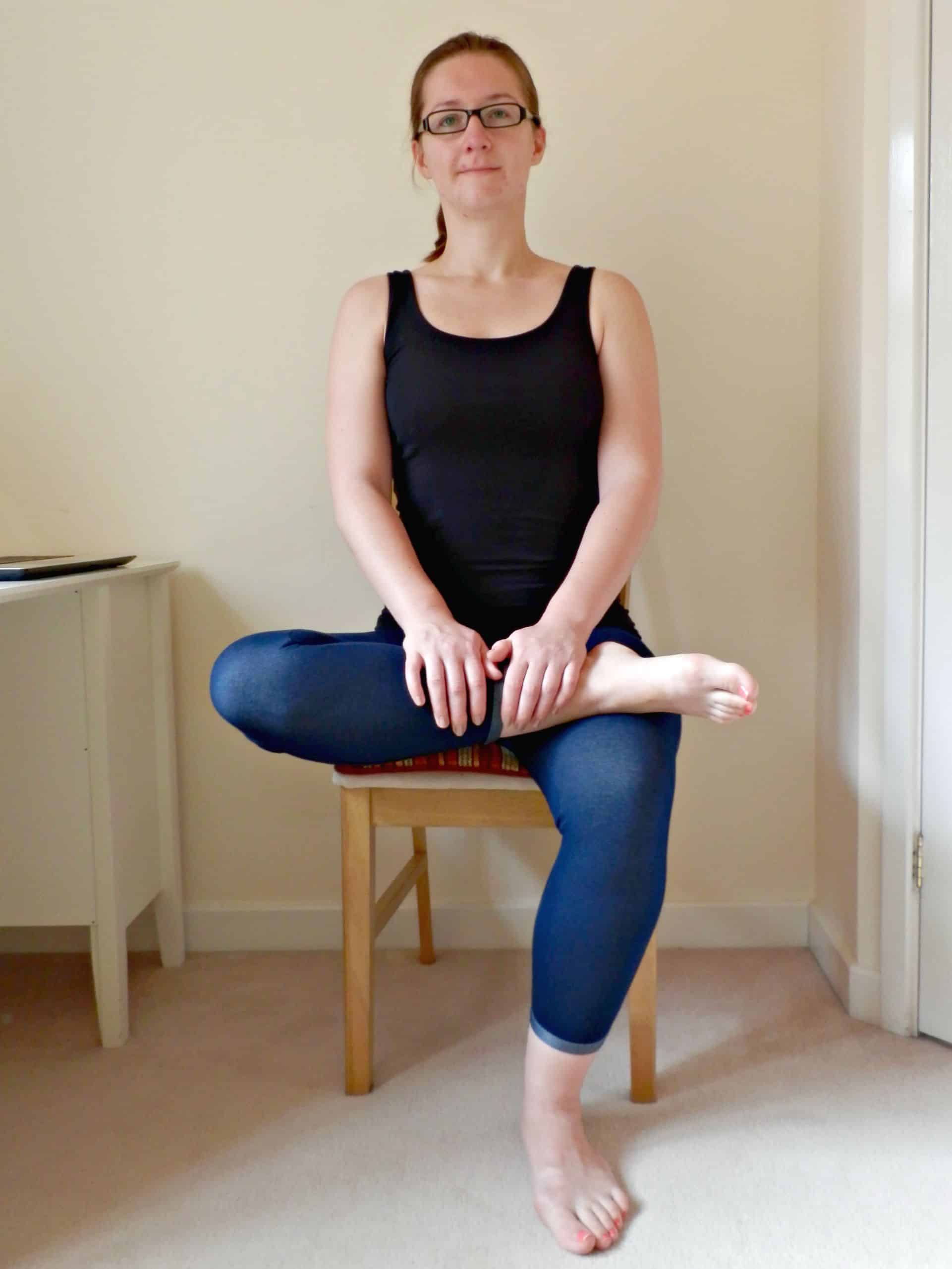 8 Yoga Stretches To Do At Your Desk
