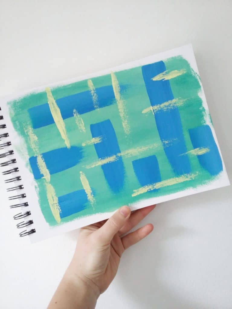 sketchbook with abstract painting